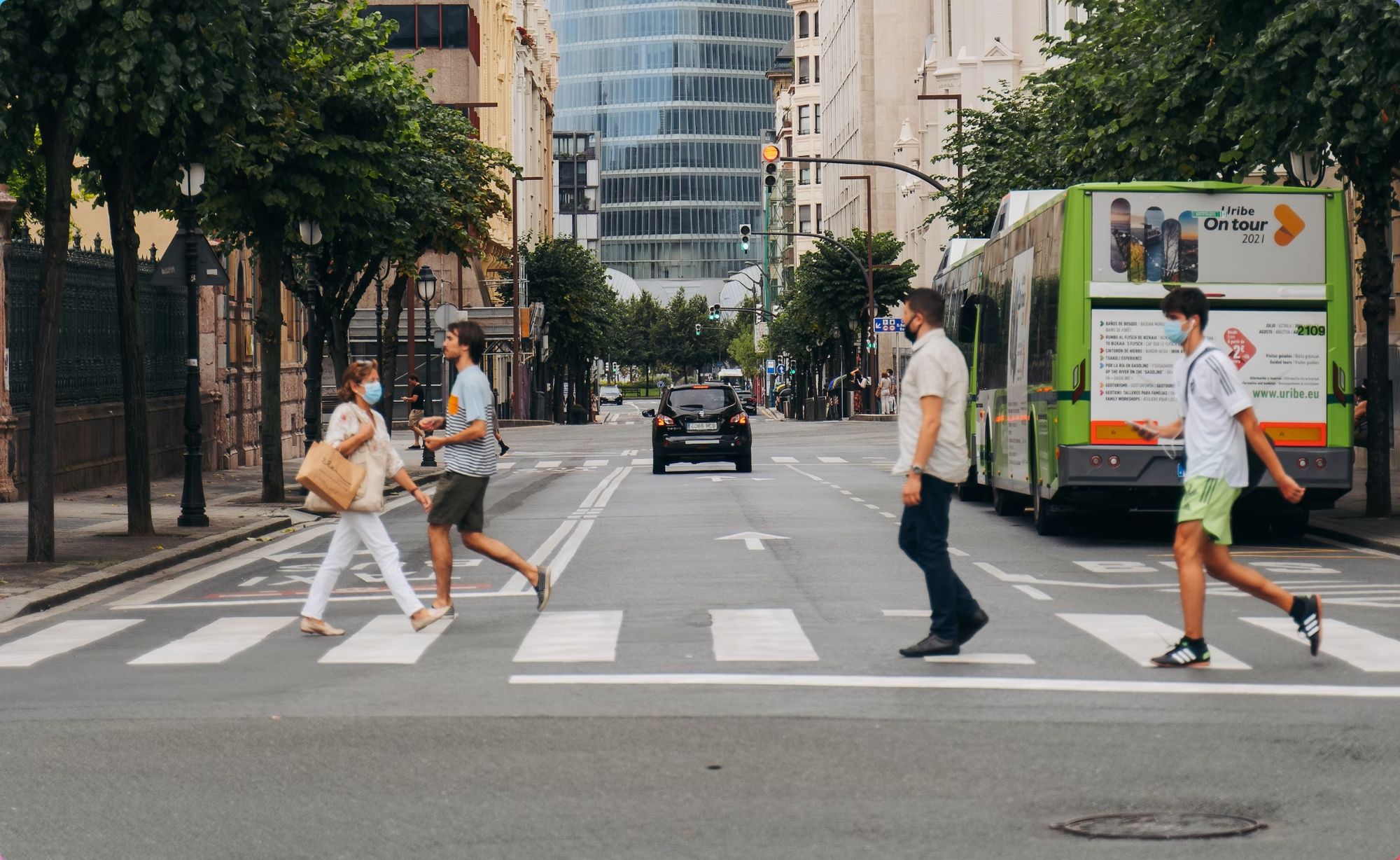 People crossing a street in Bilbao city center